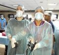Gynecologist practicing Laparoscopic Tubal Sterilization, Salpingostomy, Ovarian Drilling and Hysterectmy surgery on the Live Tissue Demonstration by Dr. J. S. Chowhan.