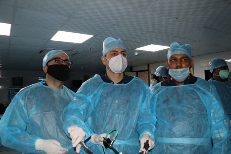 Surgeons performing TAPP Trans Abdominal Pre Peritoneal Inguinal Hernia repair on the Live Tissue. Demonstration by Dr. Rahul Pandey.