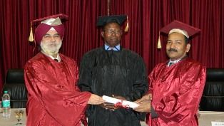 DR. STEPHEN K. KARANJA